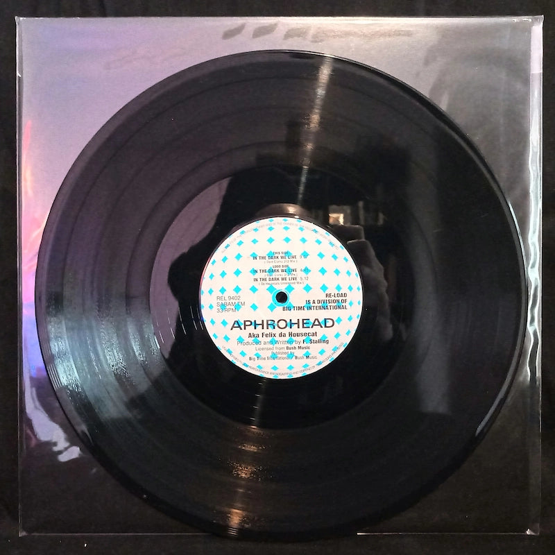 Aphrohead aka Felix Da Housecat – In The Dark We Live (Remixes) Black Vinyl REL 9402 This Side